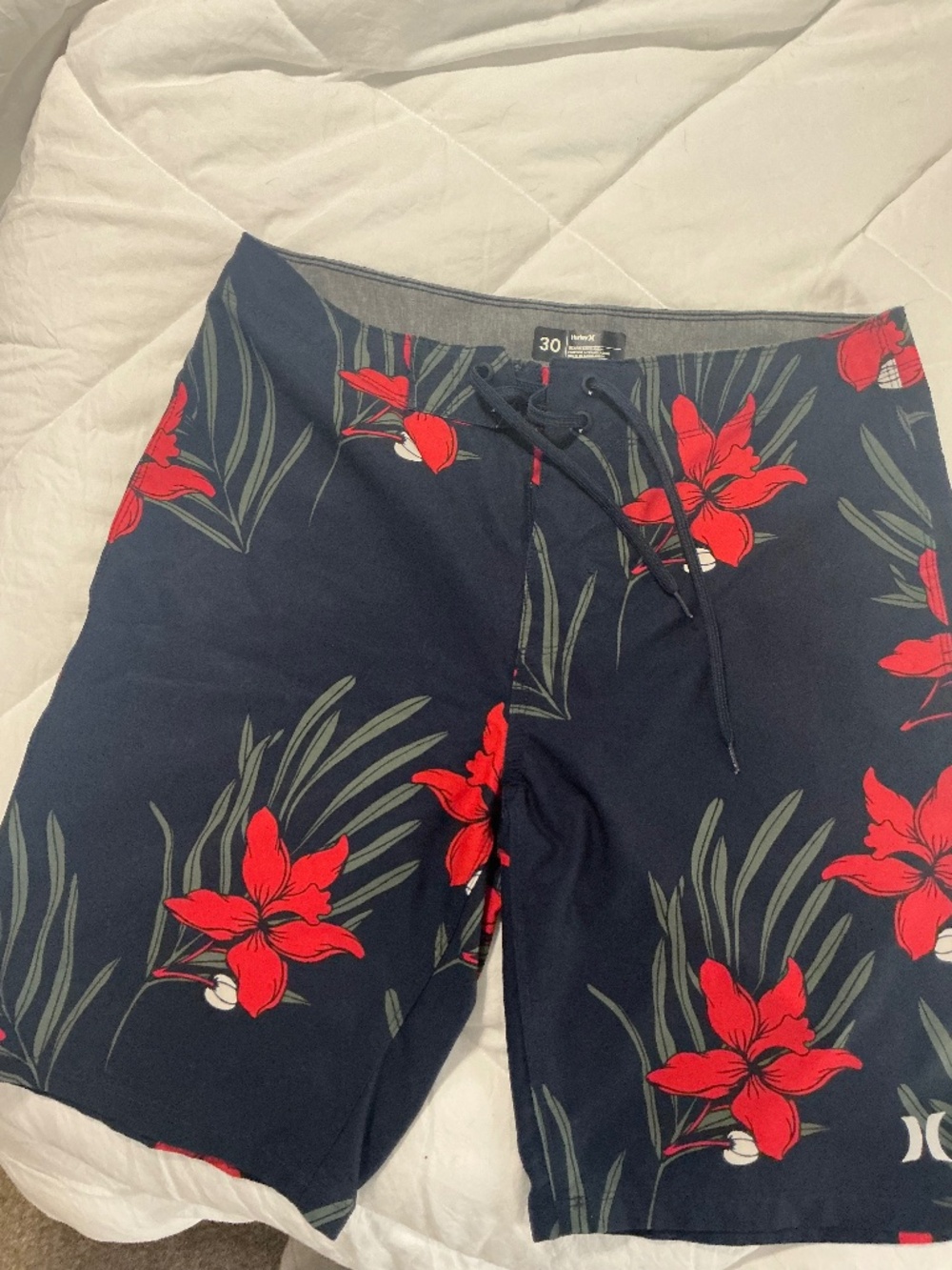 Hurley  blue board shorts with flowers size 30
